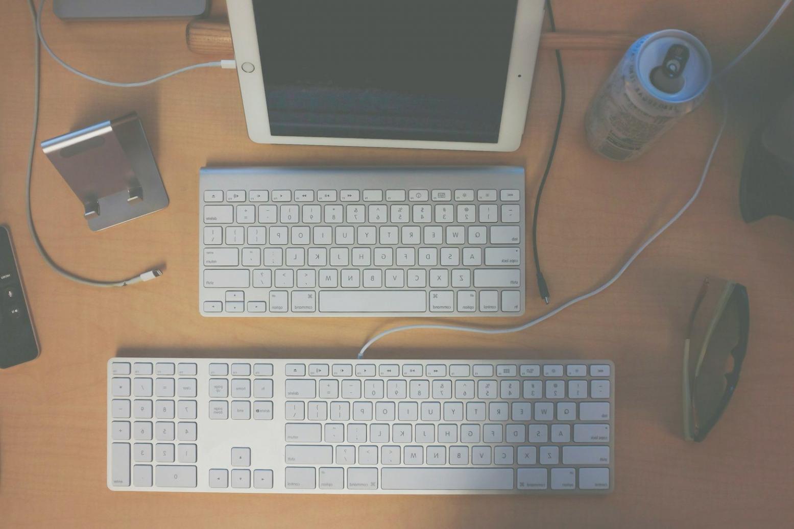 Professional workspace setup showing laptop and organised desk environment